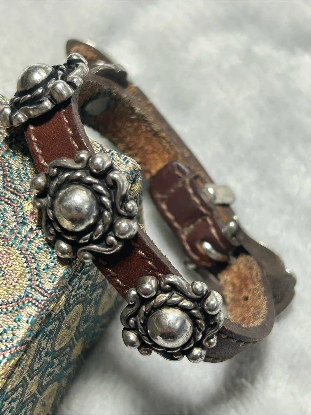 Vintage 1994 Brighton leather bracelet featuring silver-tone medallion studs